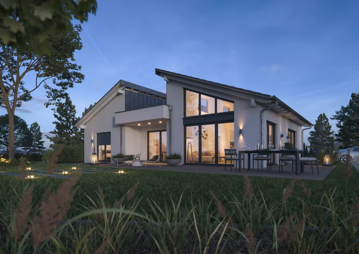 Gartenansicht Haustyp moderner Bungalow 130 mit Pultdach und architektonischen Highlights bei Abenddämmerung